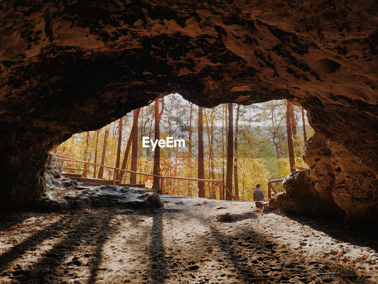 Man seen through cave