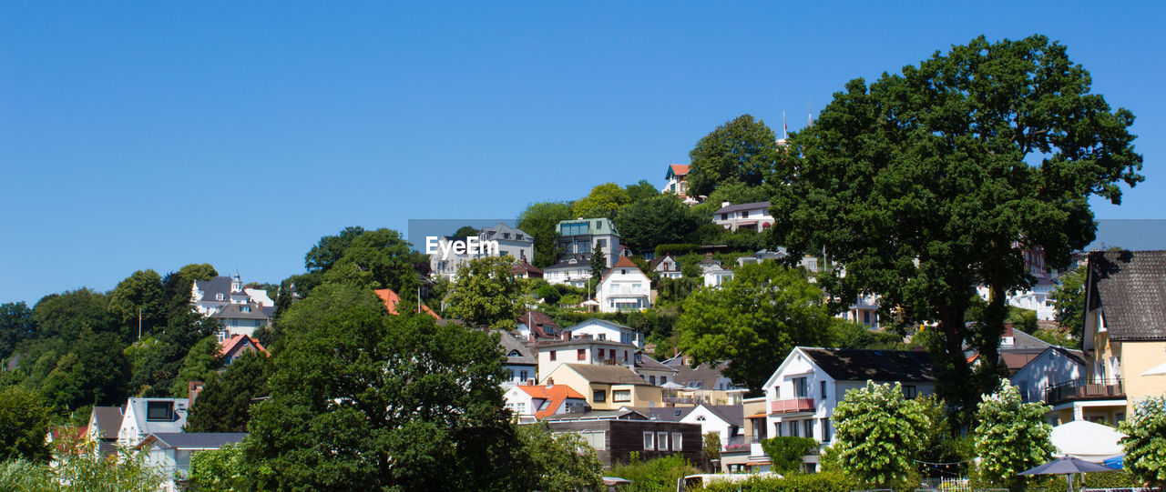 High angle view of town against clear sky