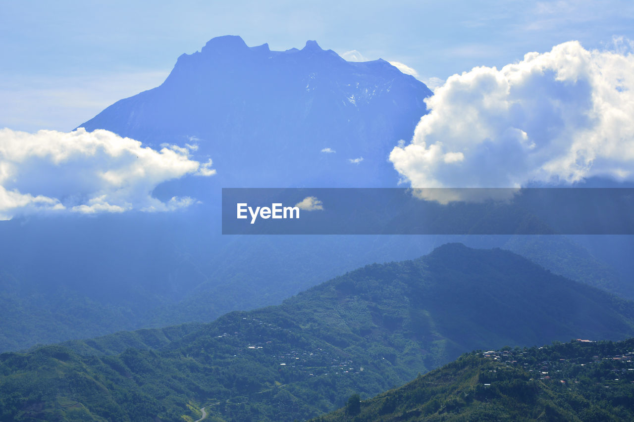 SCENIC VIEW OF MOUNTAIN RANGE AGAINST SKY