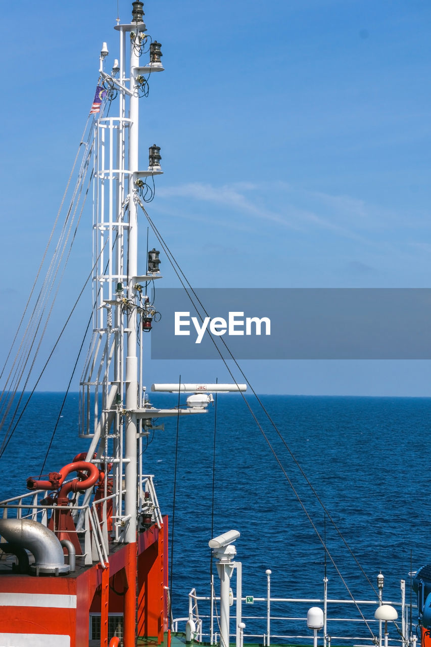 Mast of a tug boat on sea against blue sky at offshore terengganu oil field