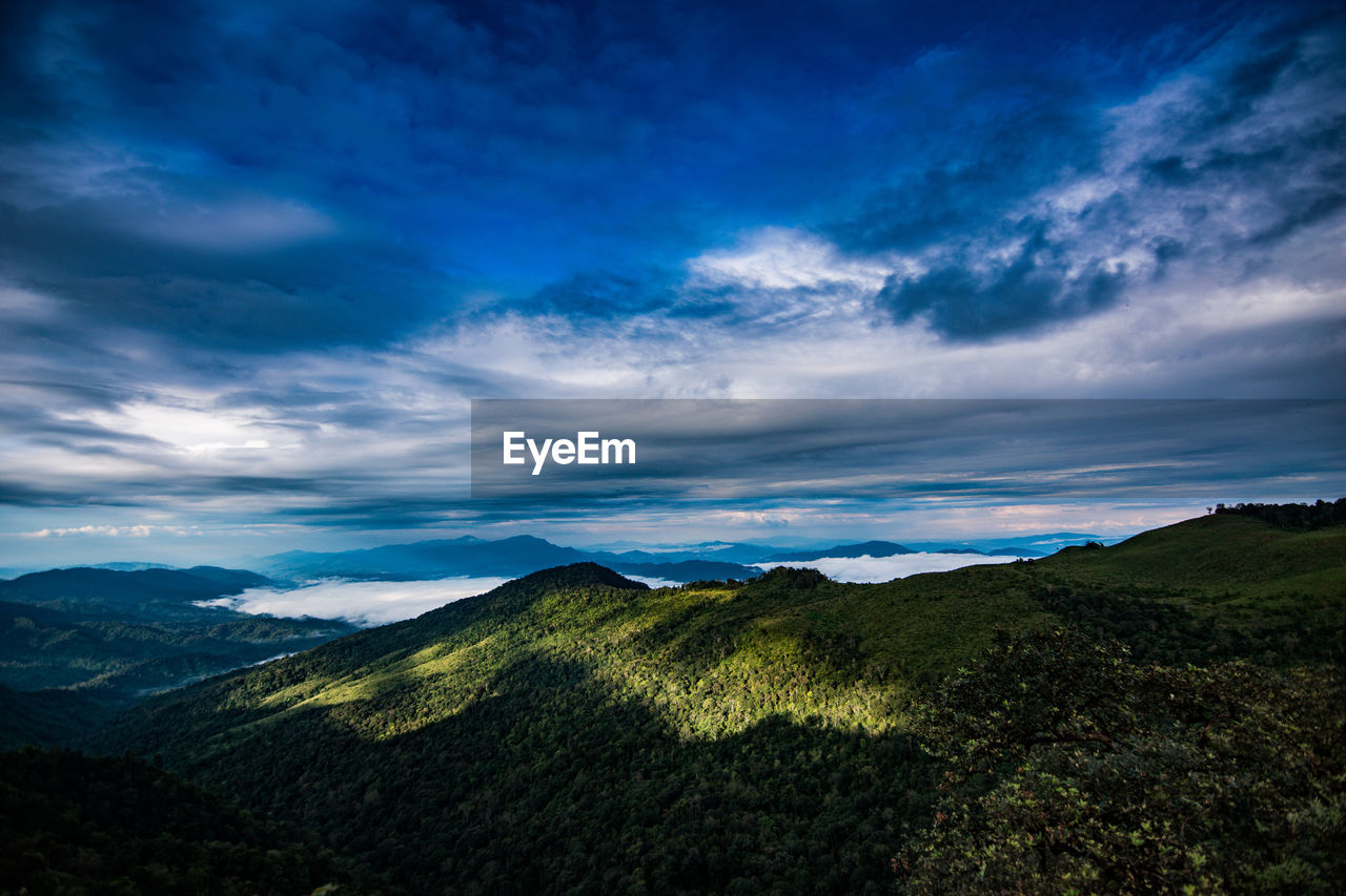 SCENIC VIEW OF MOUNTAIN AGAINST SKY