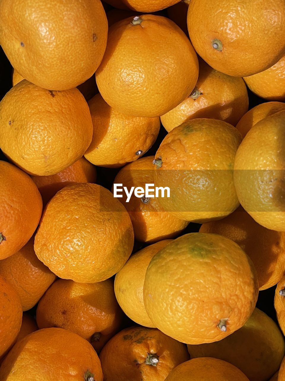 Full frame shot of mandarins for sale