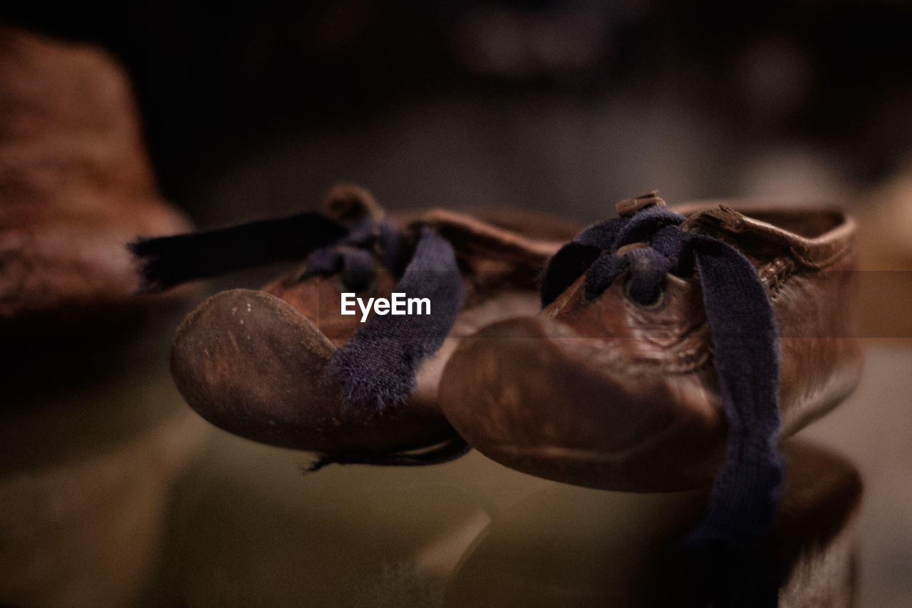 Close-up of two old baby shoes