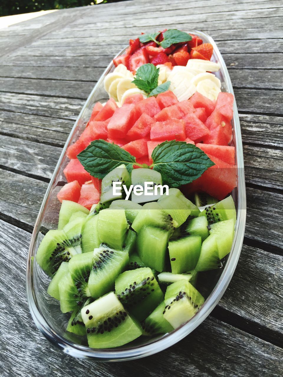 High angle view of fruits in plate on table