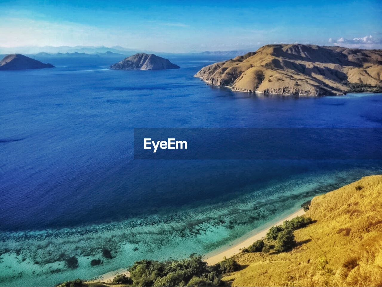 SCENIC VIEW OF SEA AGAINST BLUE SKY