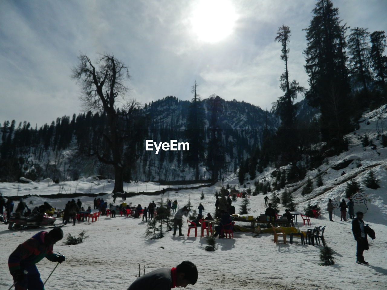 PEOPLE ON SNOW COVERED MOUNTAIN