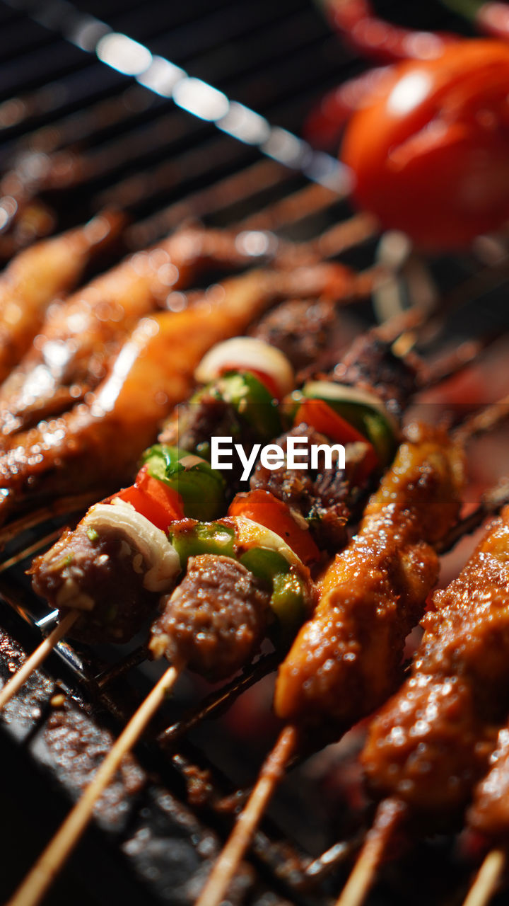 high angle view of meat on barbecue grill
