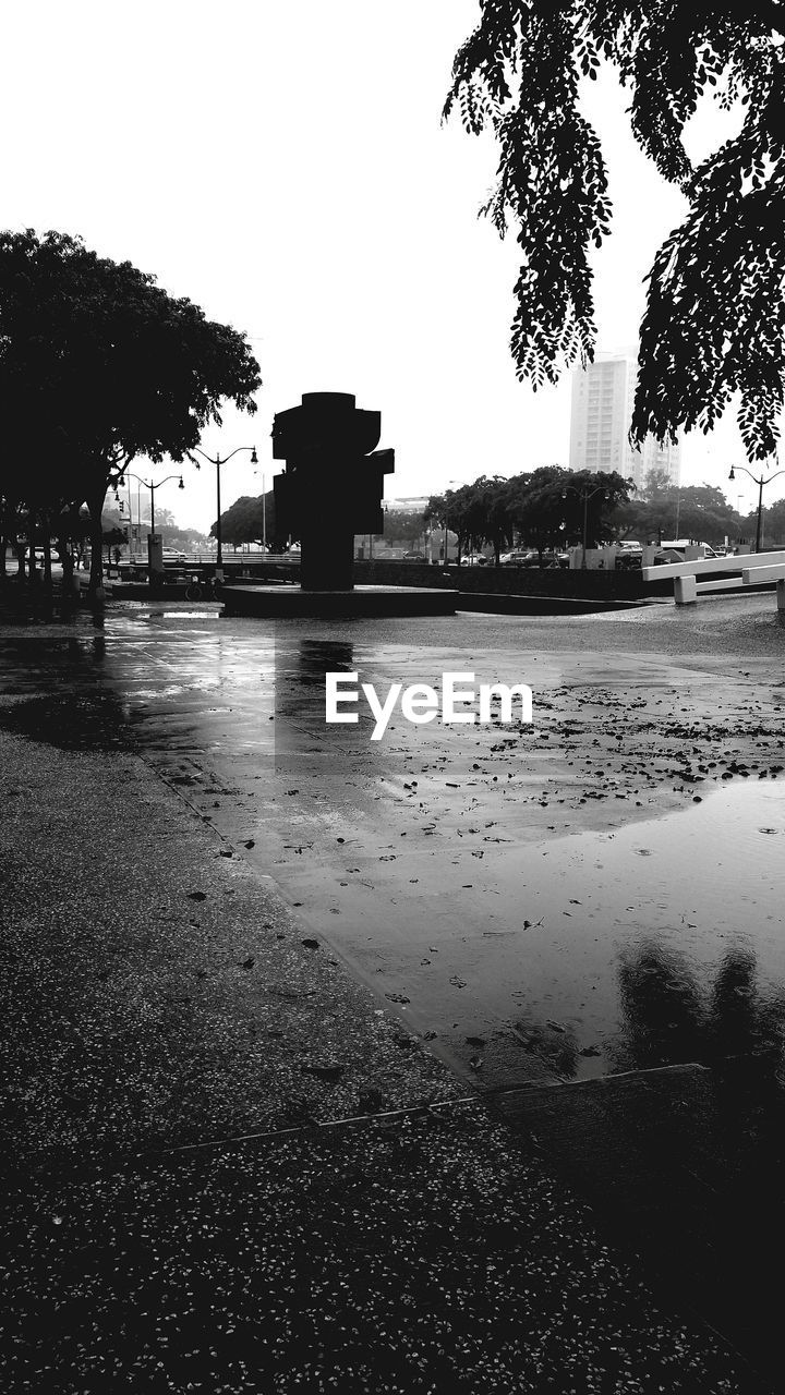 VIEW OF BUILDINGS THROUGH WATER