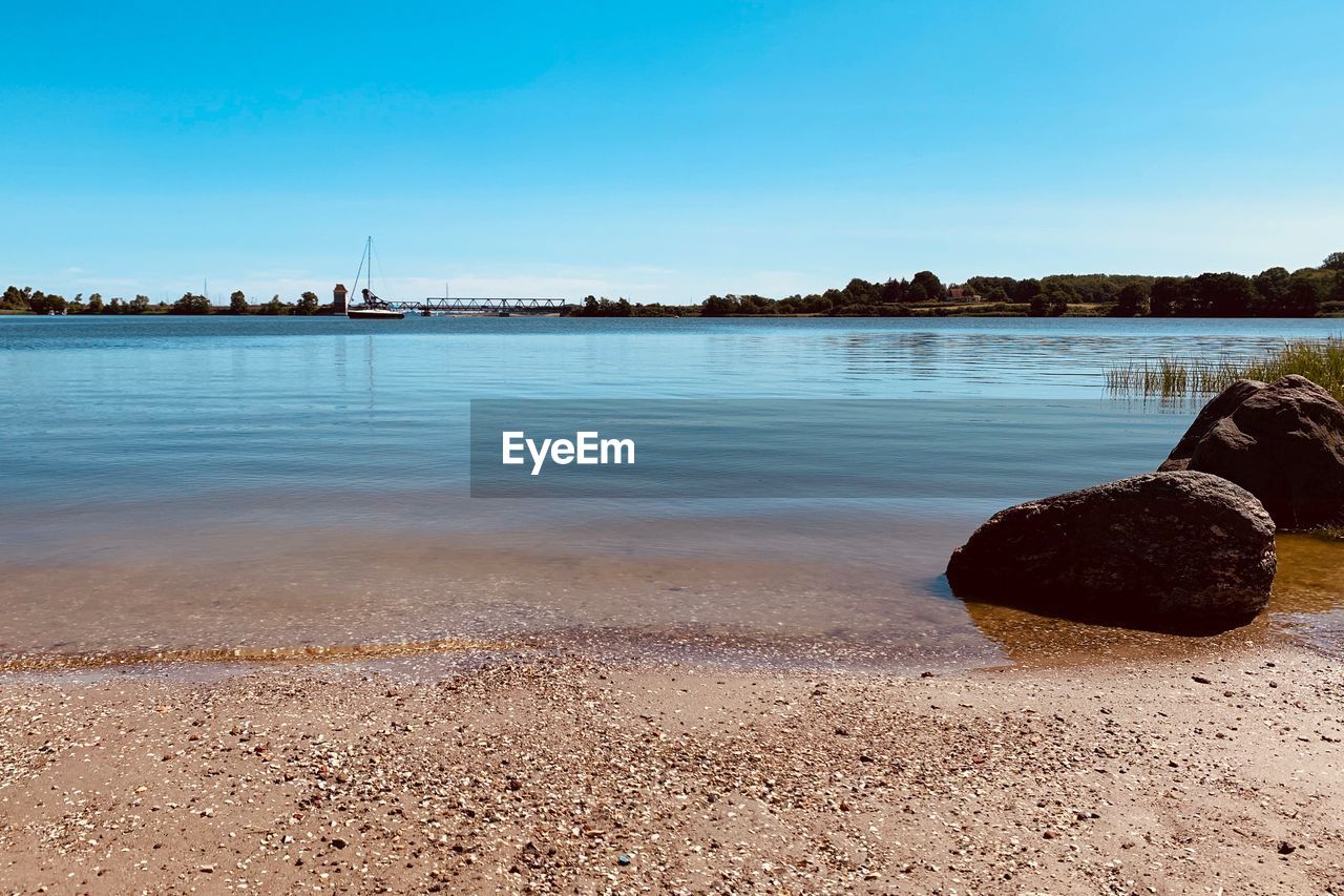 Scenic view of sea against clear sky