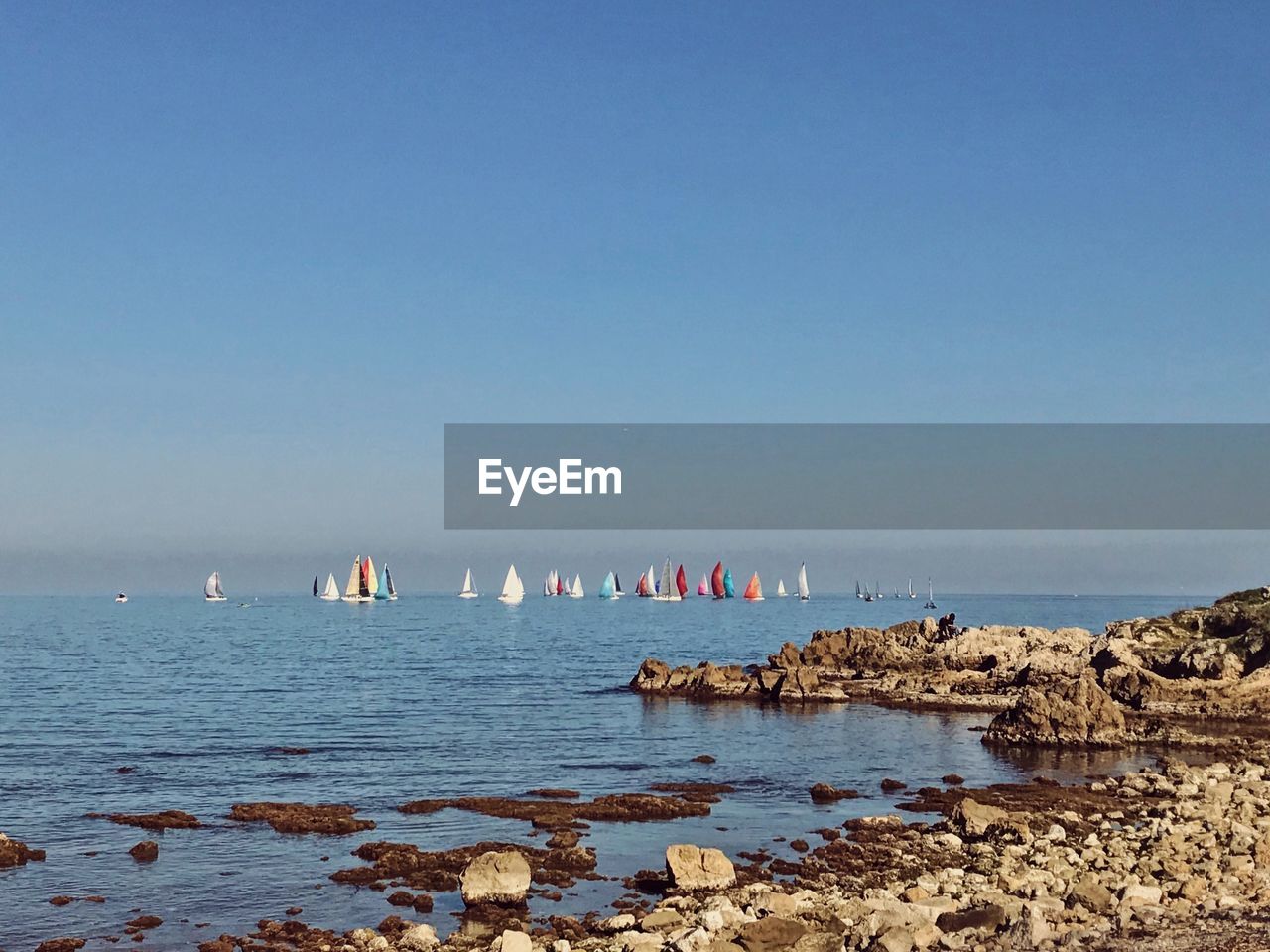 Scenic view of sea against clear sky