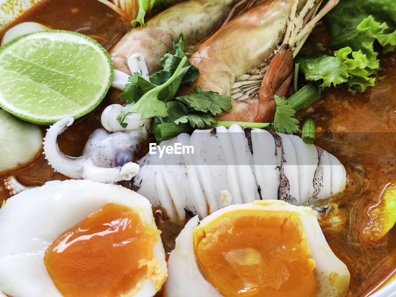 food and drink, food, healthy eating, freshness, wellbeing, dish, seafood, fish, cuisine, no people, meal, citrus fruit, asian food, indoors, serving size, still life, high angle view, close-up, vegetable, lemon, slice, japanese food, plate, fruit, herb, chinese food, animal, raw food, table