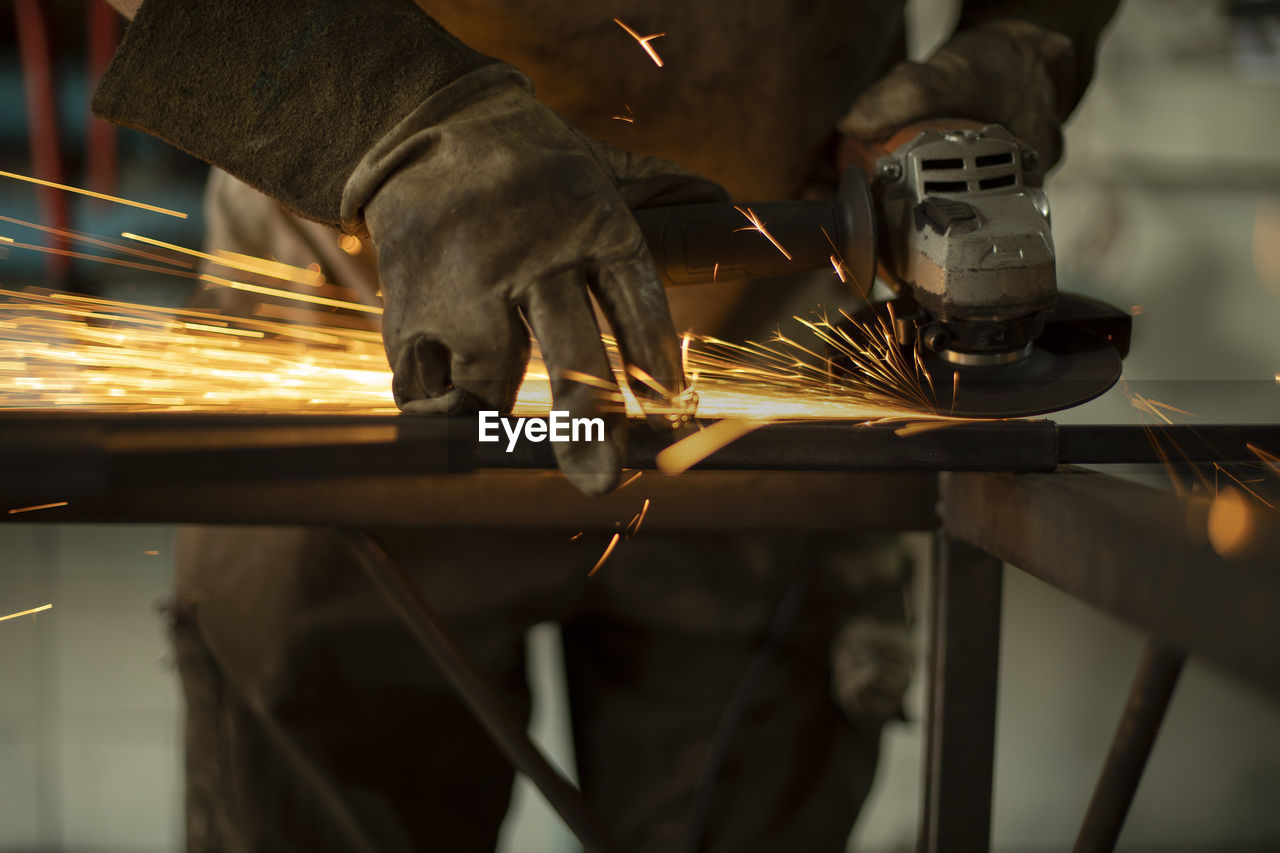 MAN WORKING IN FACTORY