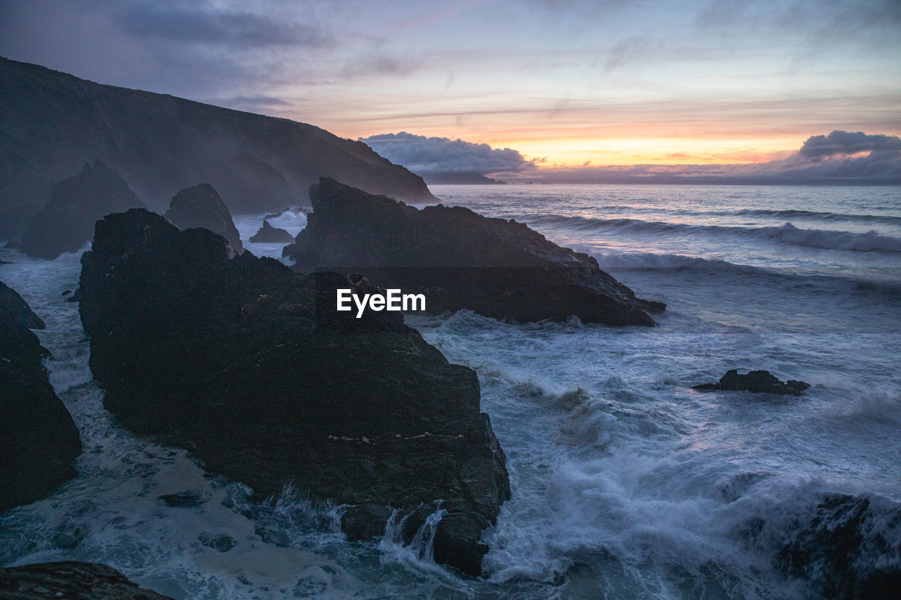Scenic view of sea against sky during sunset