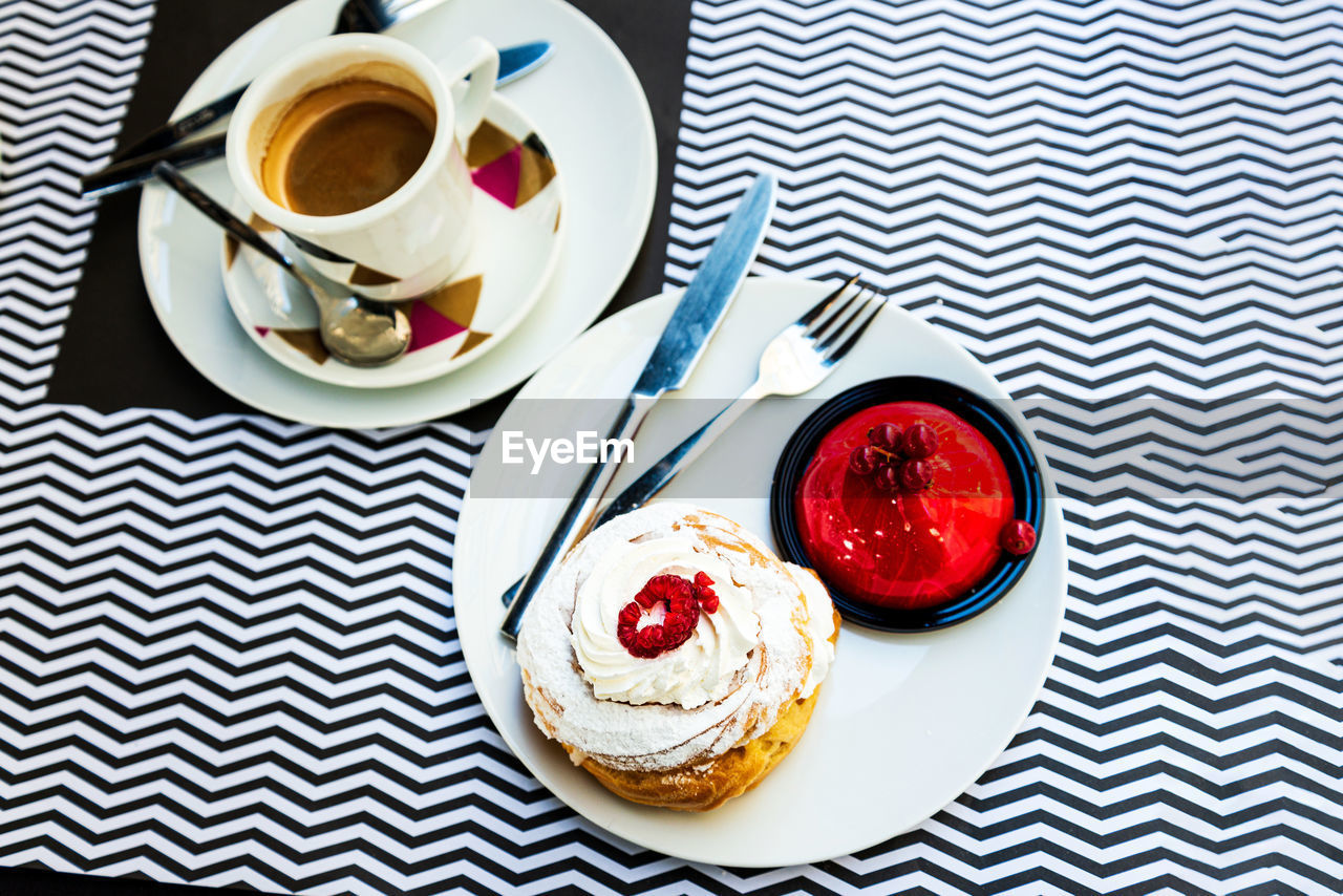 HIGH ANGLE VIEW OF COFFEE AND DESSERT ON TABLE