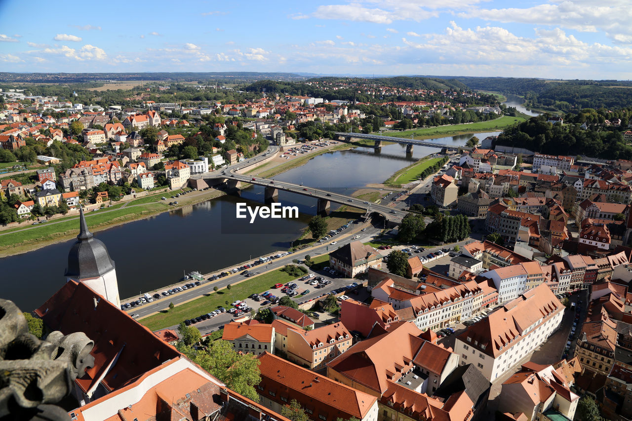 High angle view of bridge over elbe river against sky in town