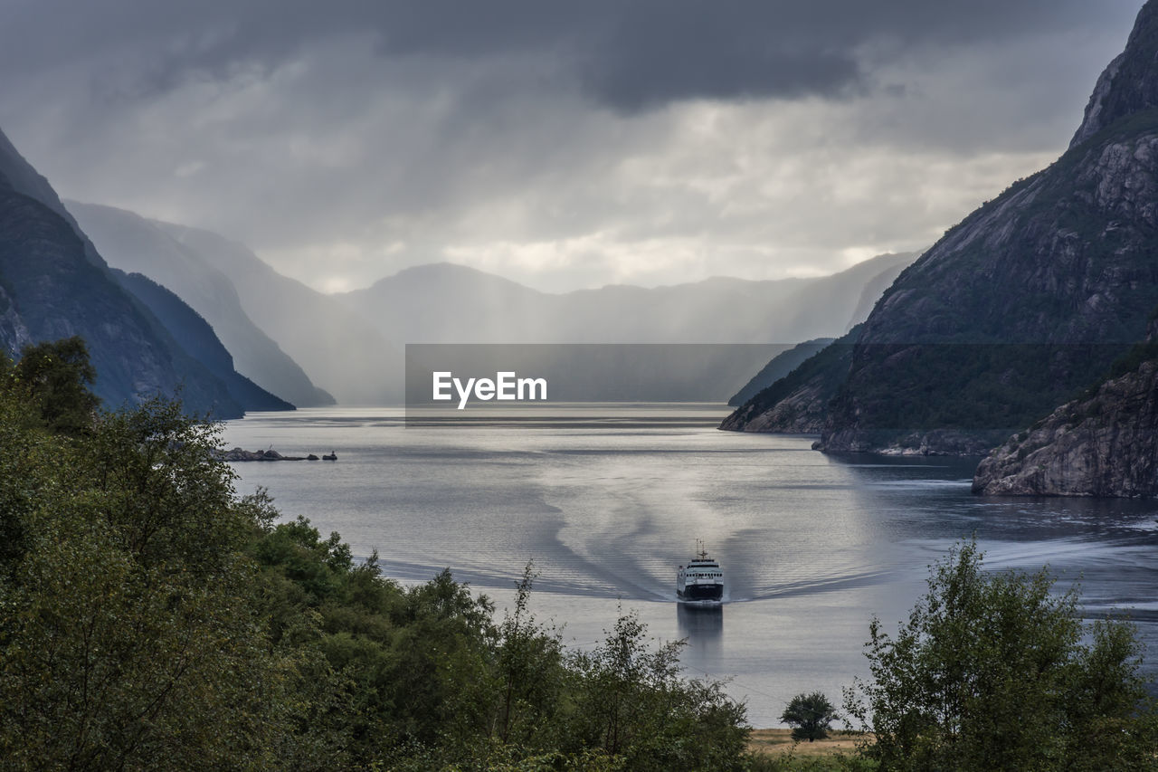 Scenic view of lysefjord against sky