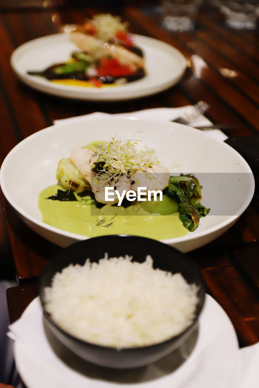 food and drink, food, healthy eating, wellbeing, meal, freshness, plate, dish, vegetable, no people, indoors, restaurant, cuisine, table, dinner, focus on foreground, asian food, supper, selective focus, close-up, lunch, seafood, crockery, serving size, high angle view