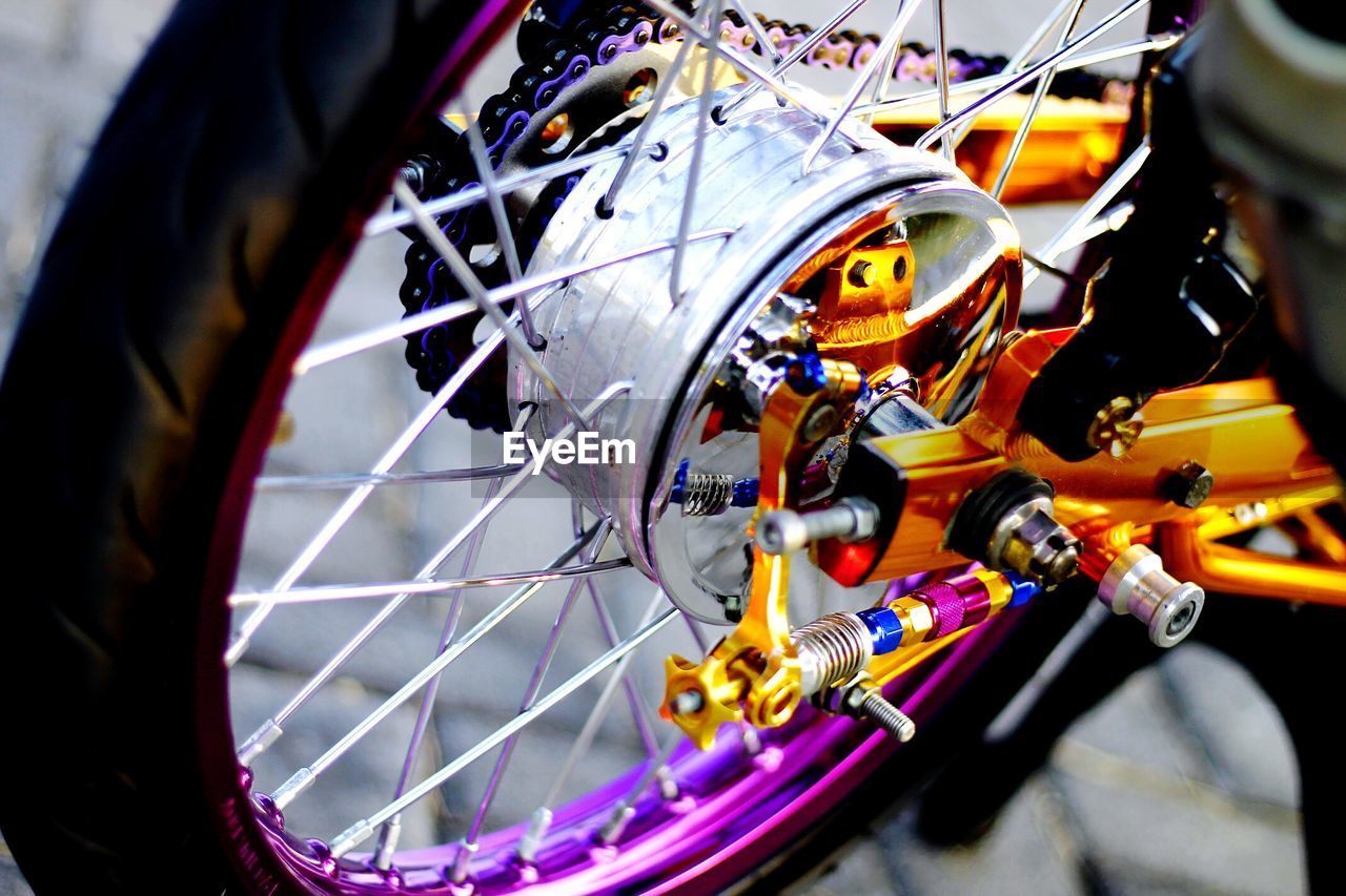High angle view of colorful bicycles wheel