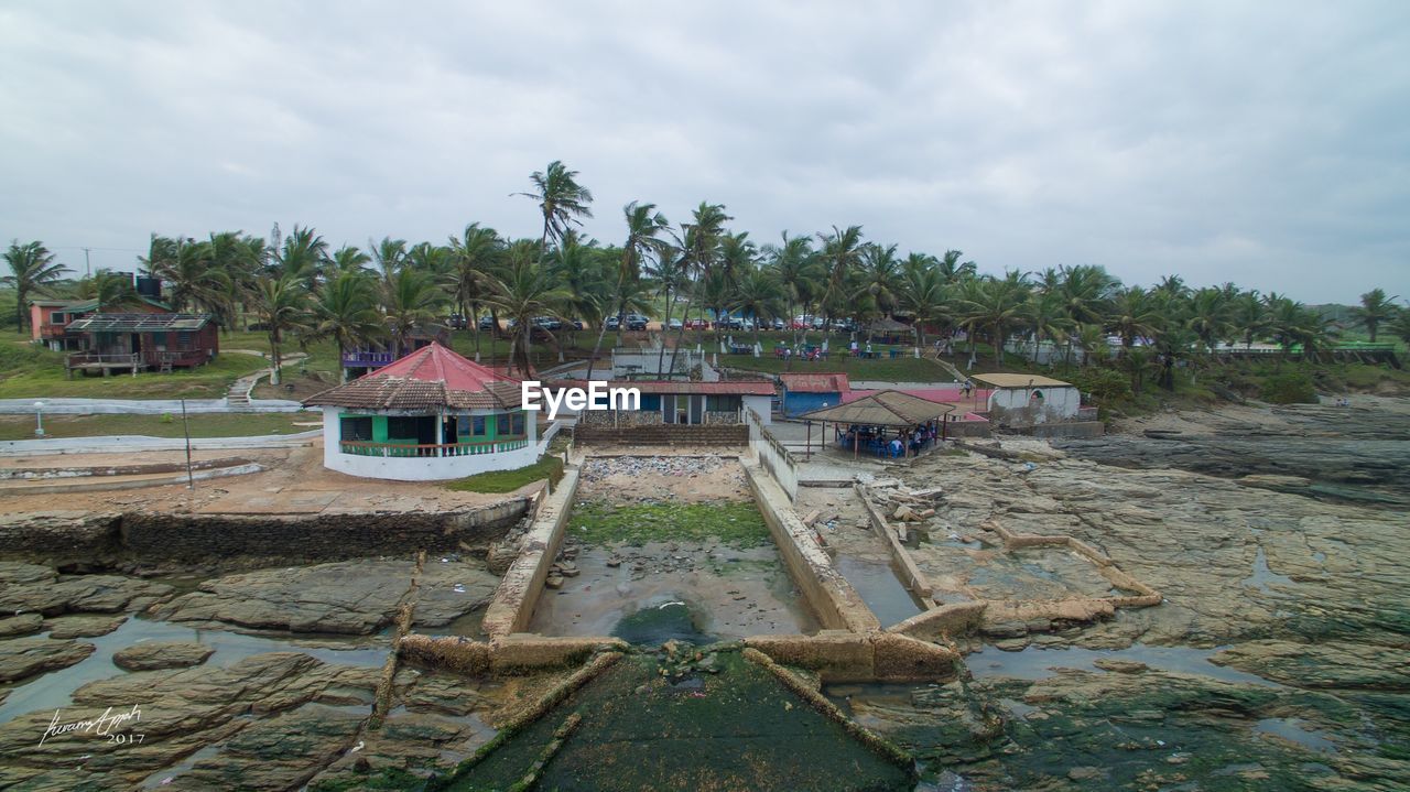 BUILT STRUCTURE AGAINST TREES