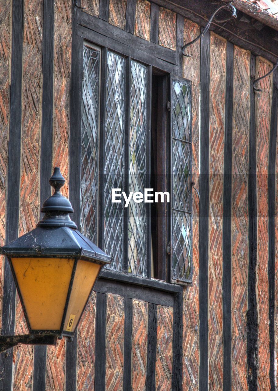 Close-up of window and historic wall