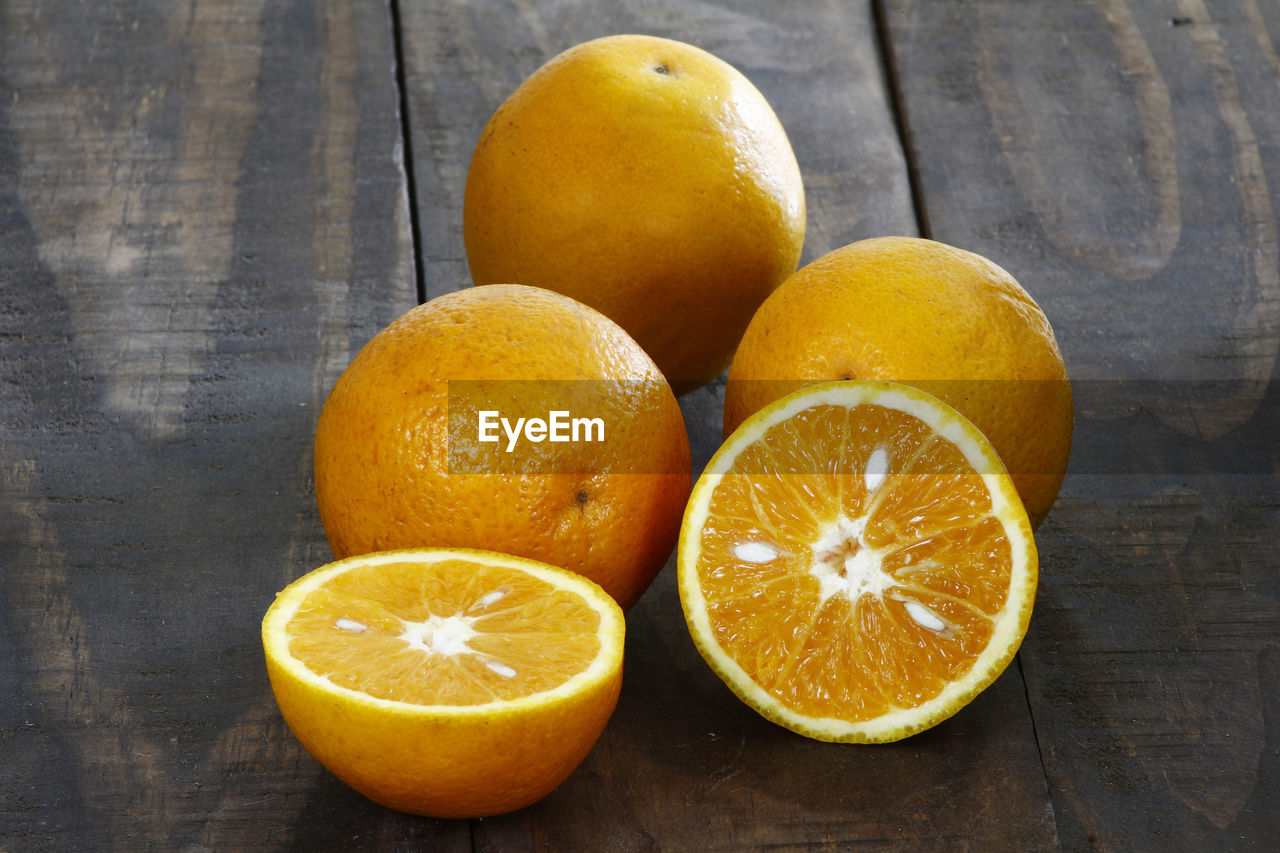 Close-up of oranges on table