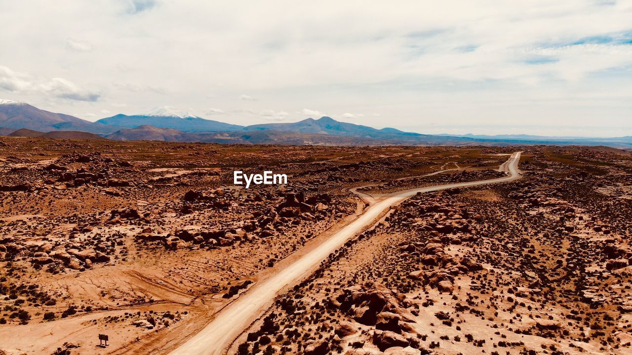 Scenic view of desert against sky