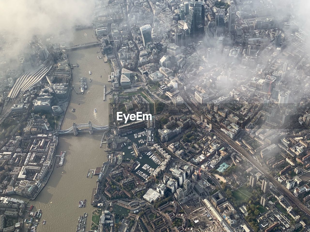 Aerial view of river amidst cityscape