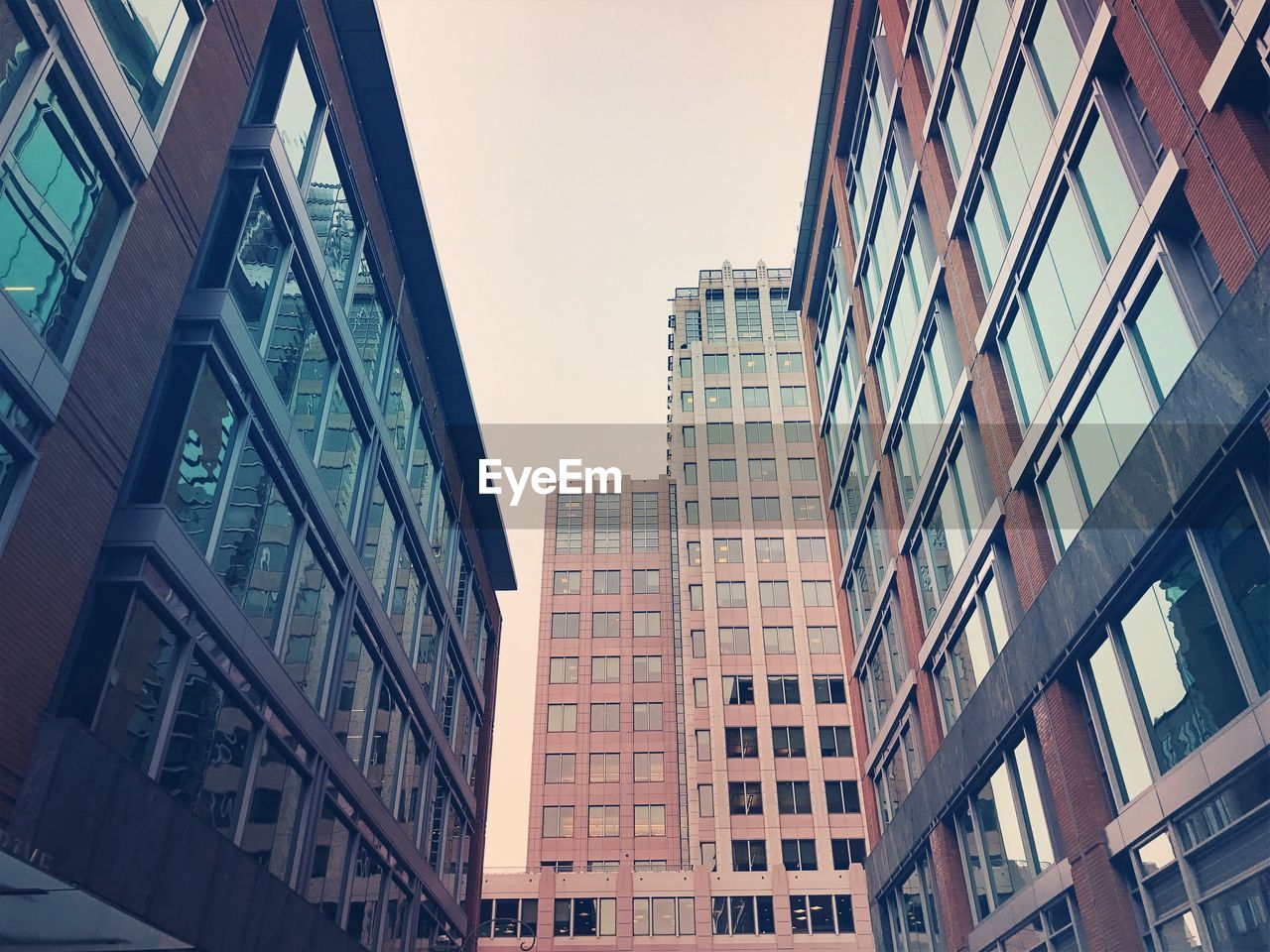 Low angle view of skyscrapers against sky