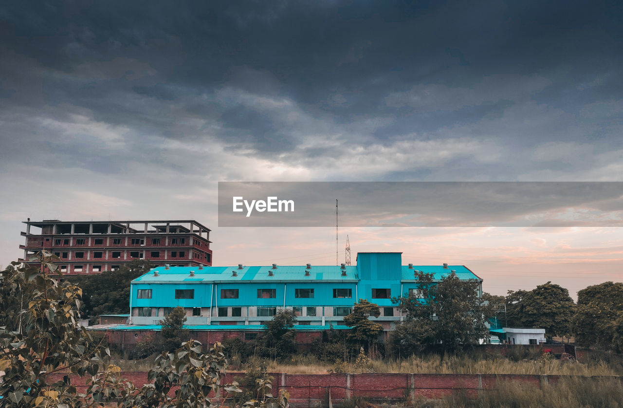 Low angle view of buildings against sky