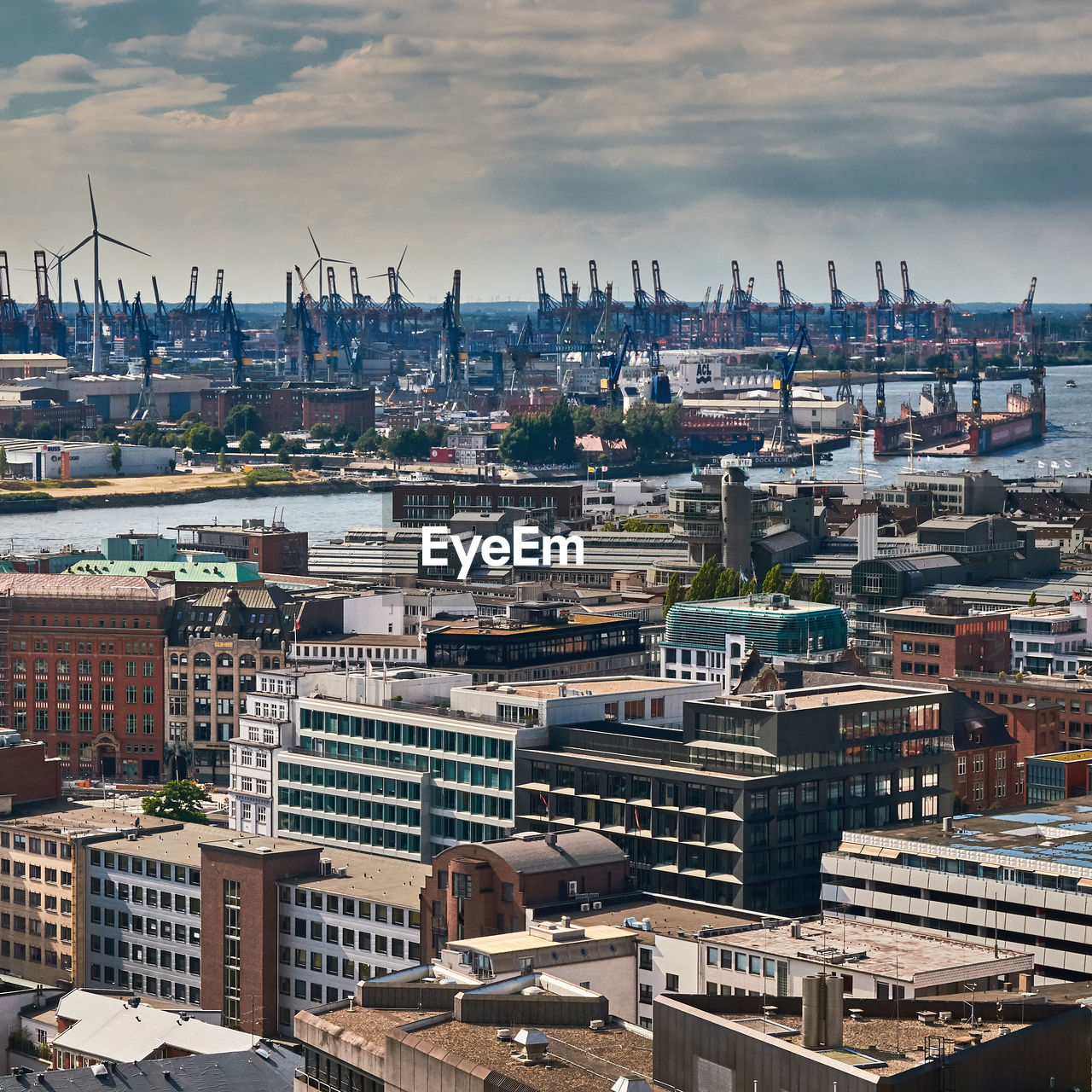 High angle view of buildings in city against sky