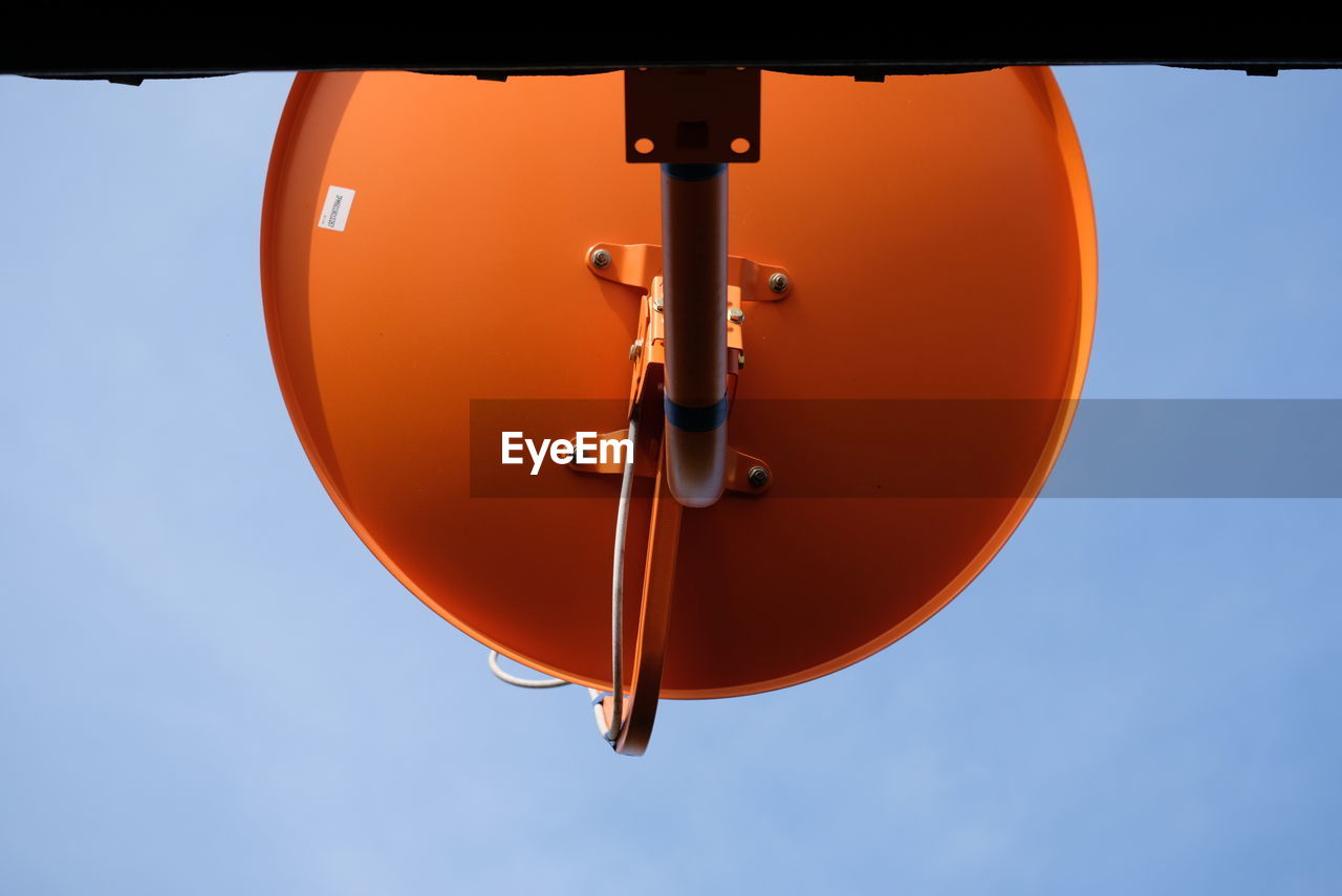 LOW ANGLE VIEW OF LIGHTING EQUIPMENT AGAINST SKY