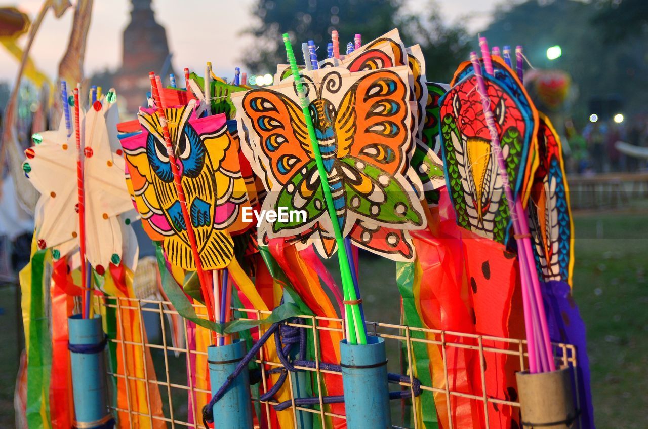 Close-up of multi colored toys for sale in market