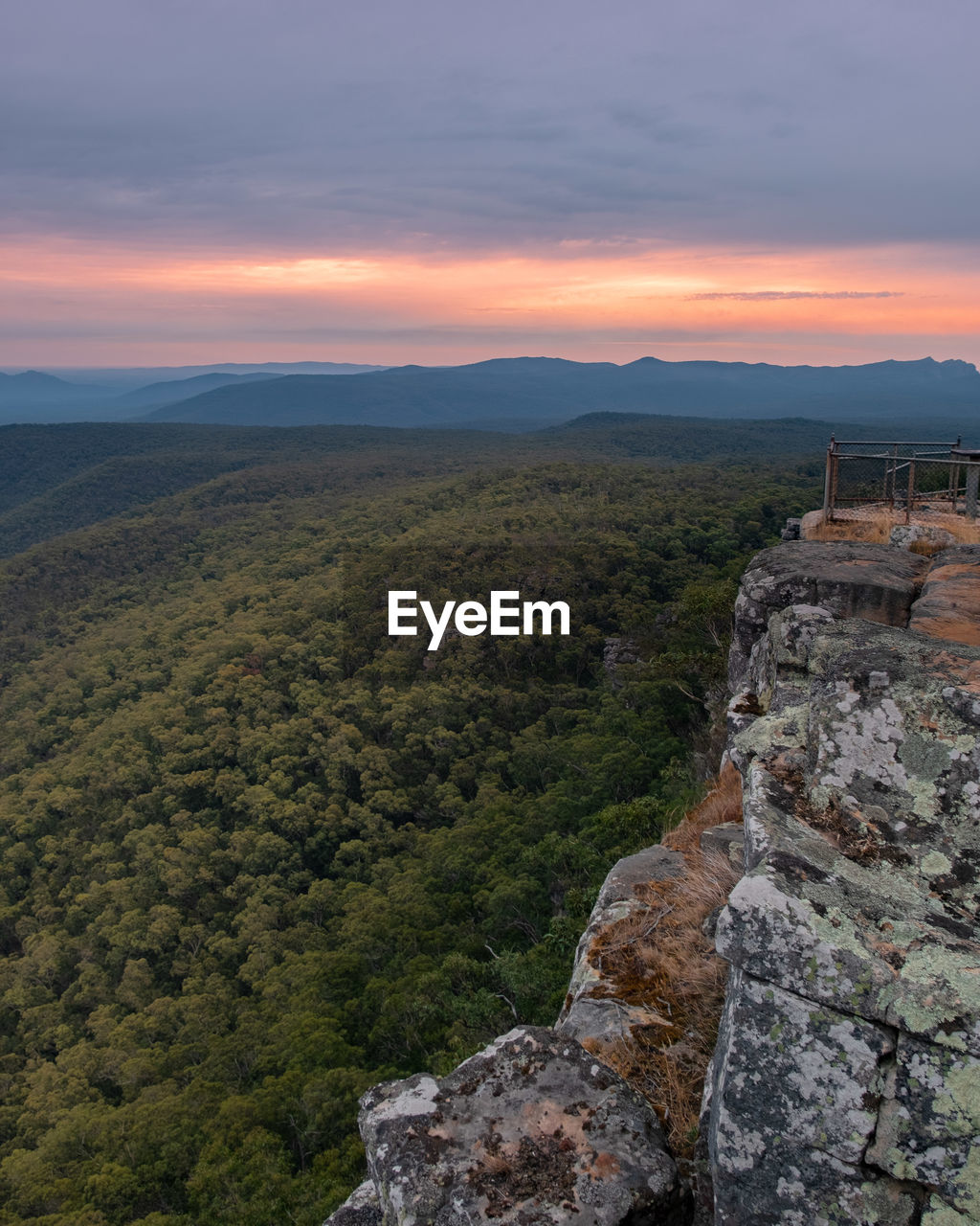 Scenic view of landscape against sky during sunset