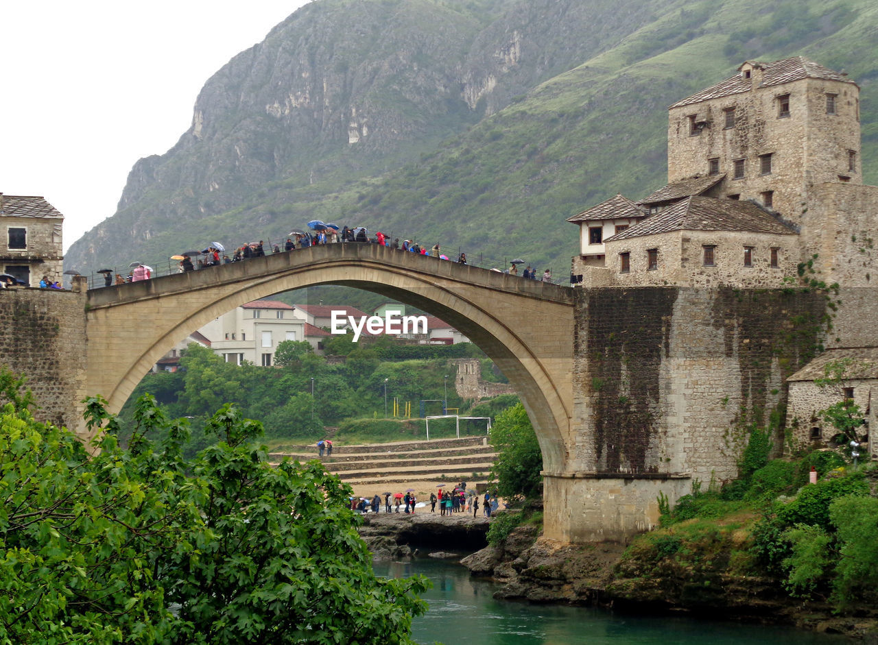 Arch bridge over river