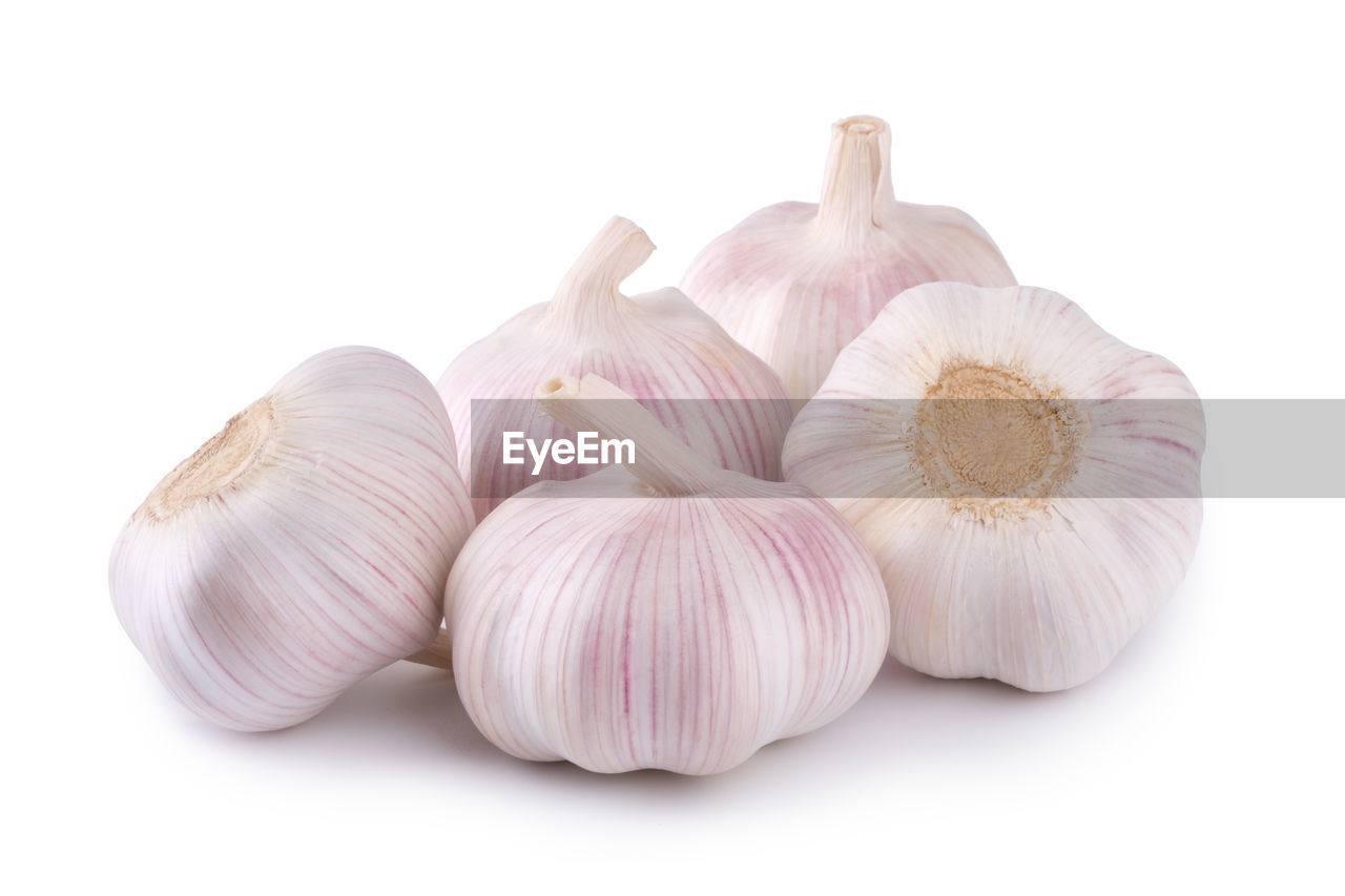 Fresh garlic on white background