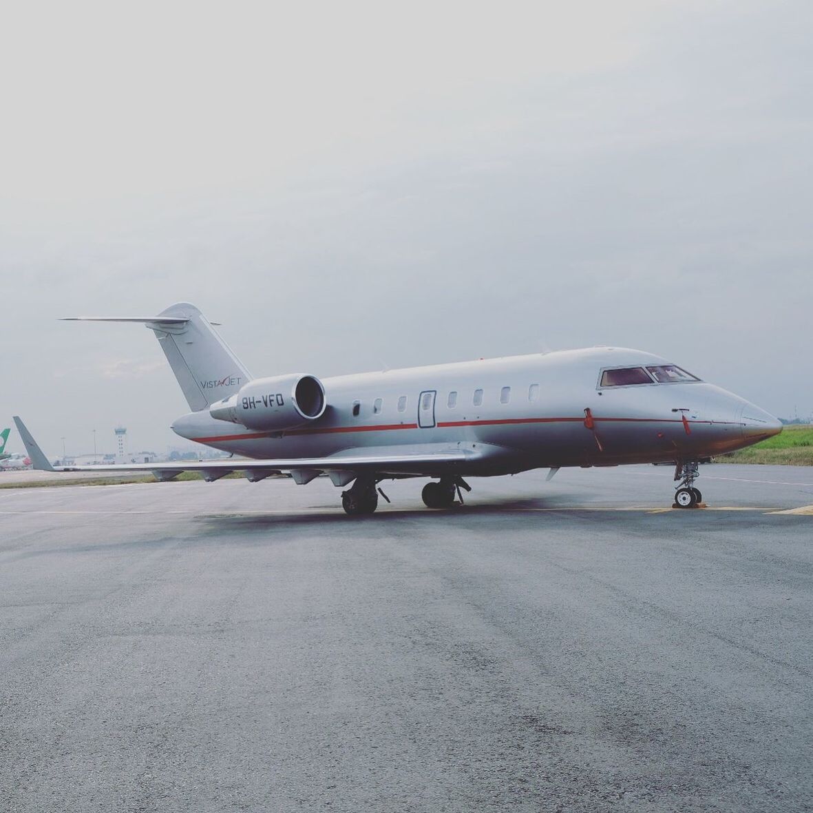 AIRPLANE ON RUNWAY AGAINST SKY