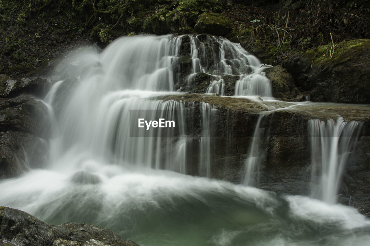 motion, waterfall, long exposure, scenics - nature, blurred motion, beauty in nature, flowing water, water, forest, no people, flowing, rock, rock - object, solid, land, nature, tree, environment, day, outdoors, power in nature, rainforest, falling water