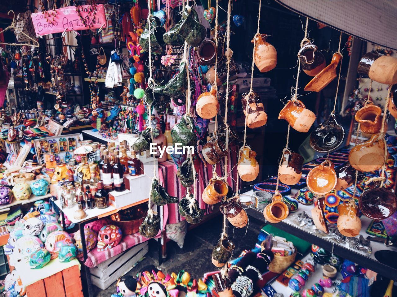 HIGH ANGLE VIEW OF MULTI COLORED LANTERNS FOR SALE IN MARKET