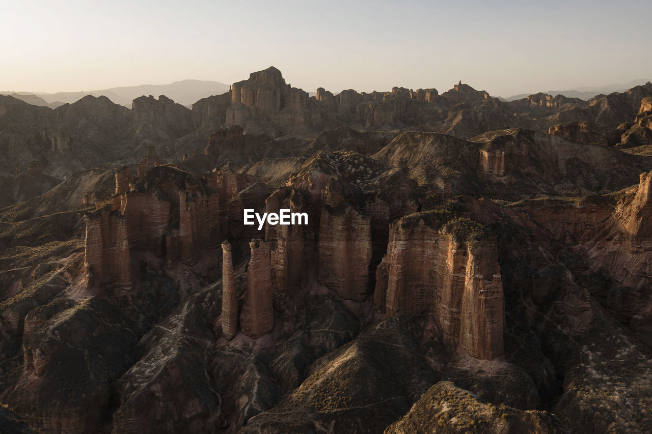 Aerial view of rocky landscape against sky