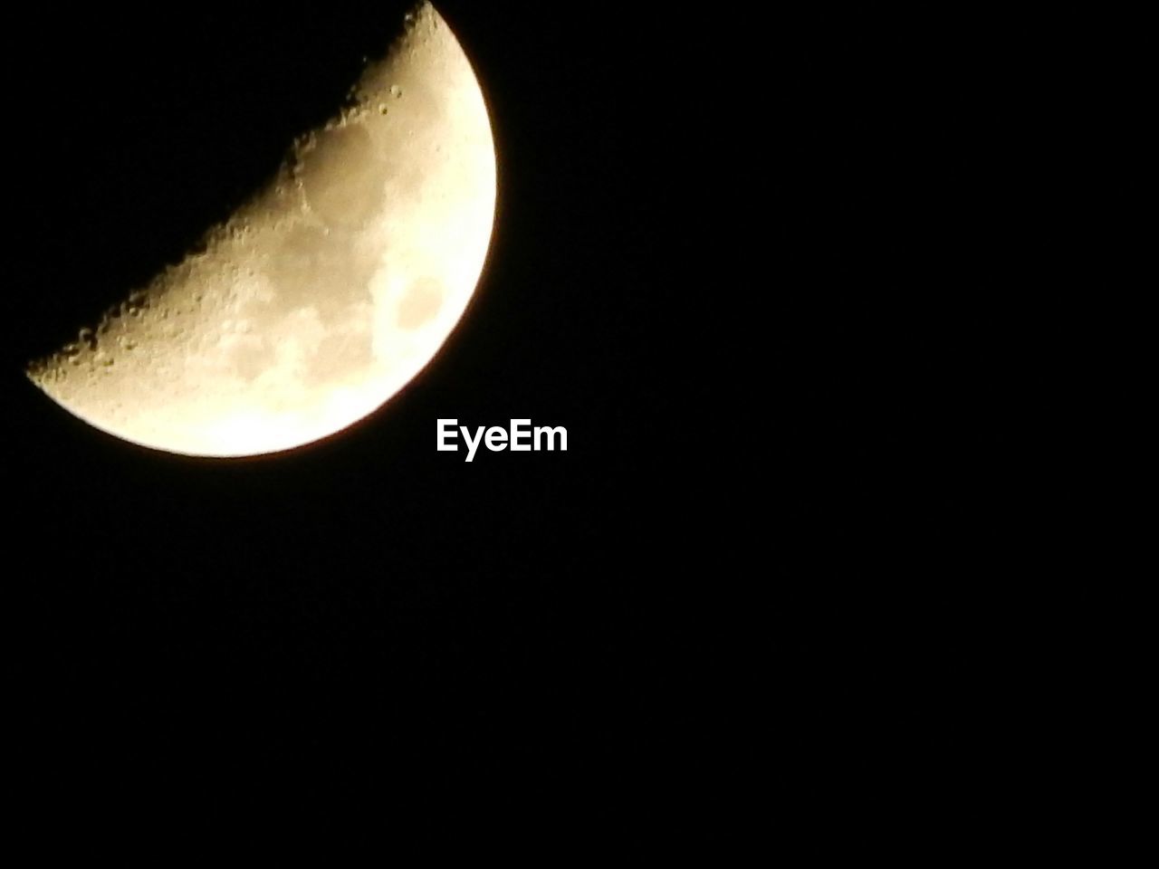 LOW ANGLE VIEW OF MOON IN THE DARK