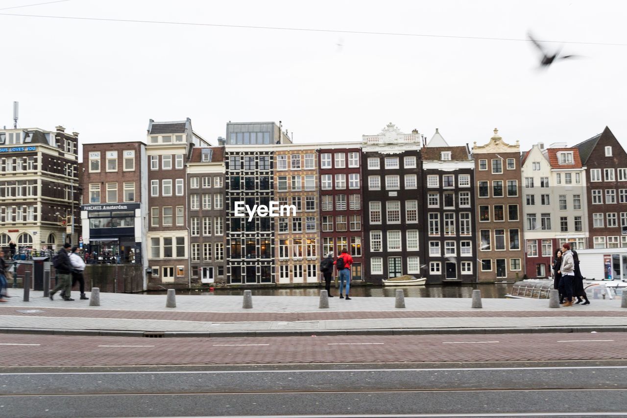 VIEW OF CITY STREET AND BUILDINGS