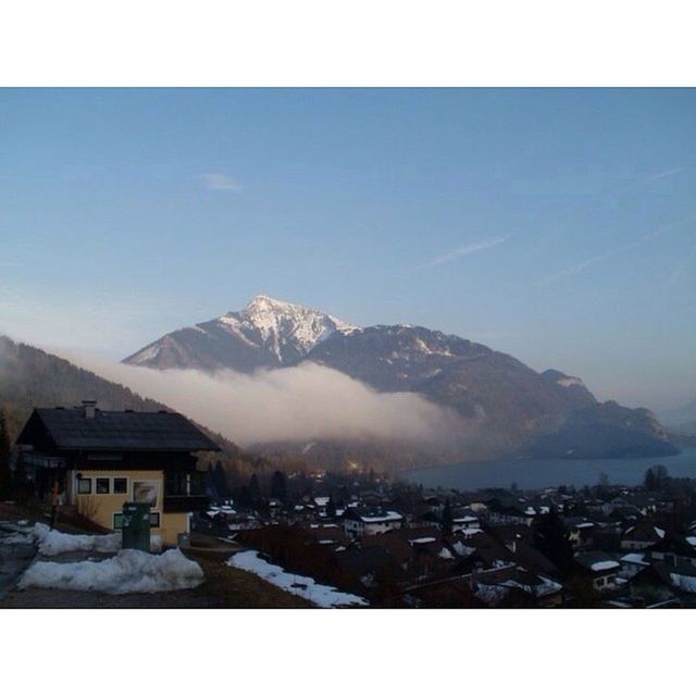 SCENIC VIEW OF SNOW COVERED MOUNTAINS AGAINST SKY