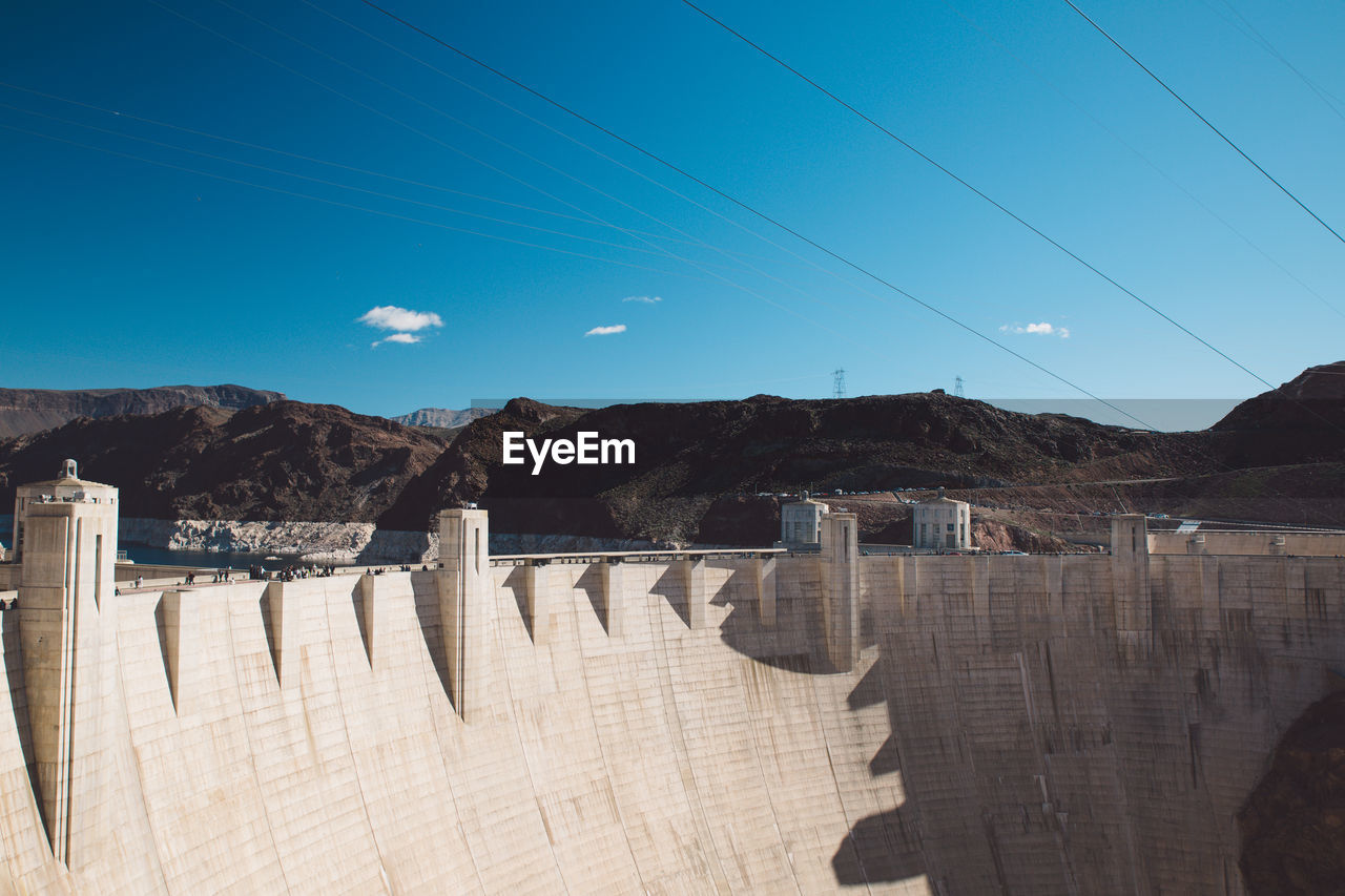 Scenic view of dam against sky