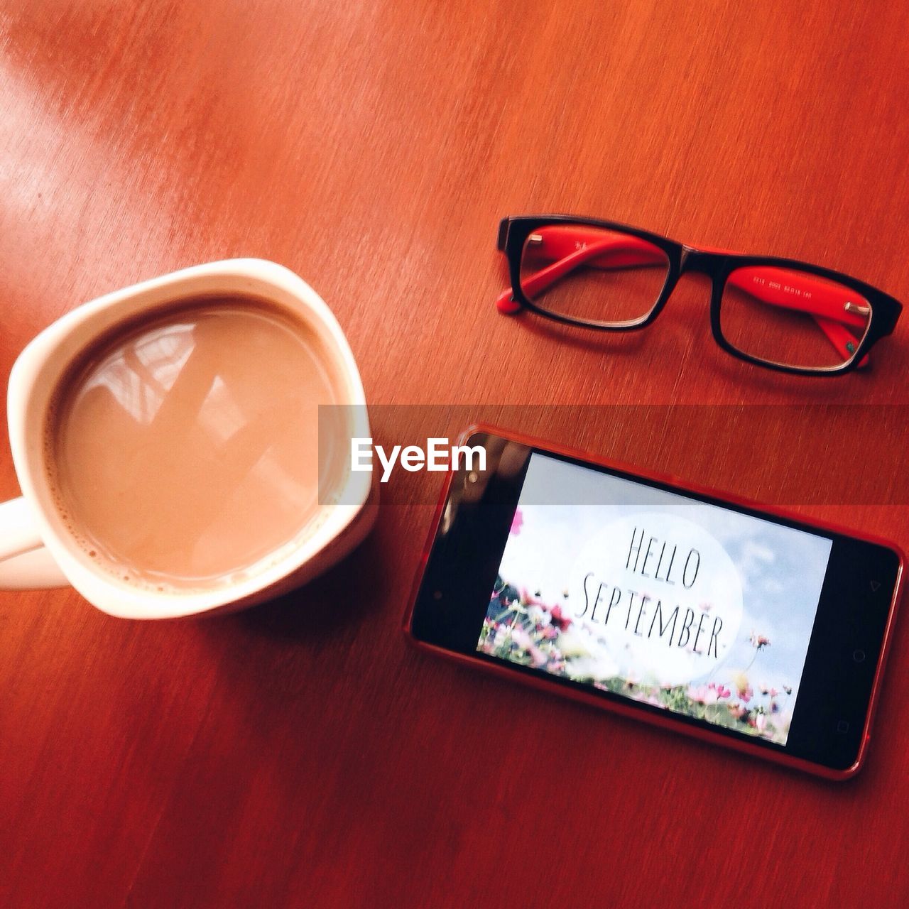 CLOSE-UP OF EYEGLASSES ON LAPTOP