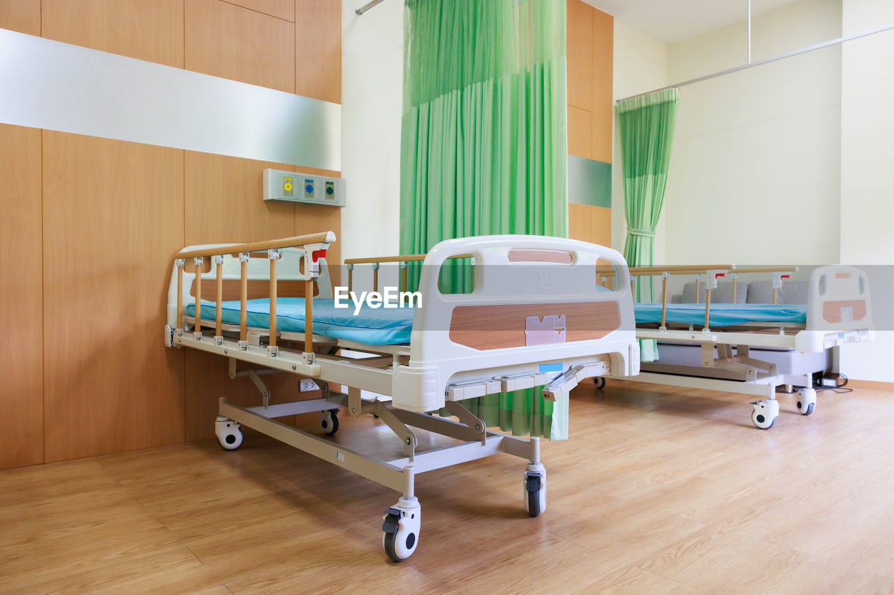 Two beds in common patient room. recovery room with beds and comfortable medical. 