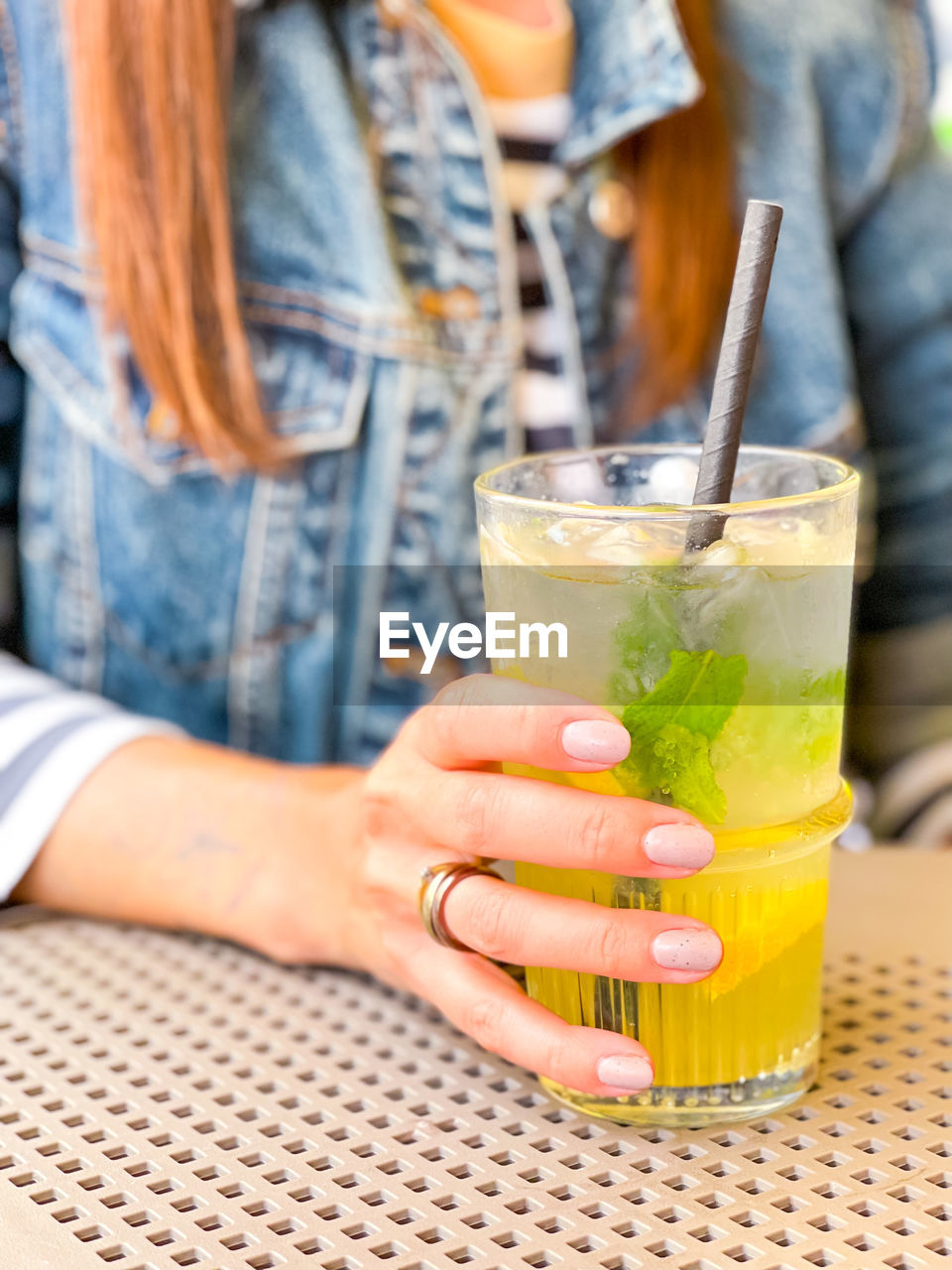 Close-up of woman holding drink