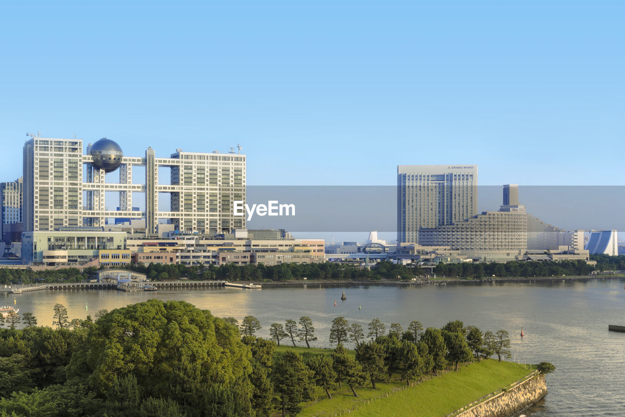 View of the bay of odaiba with daiba park,mall and hotels.