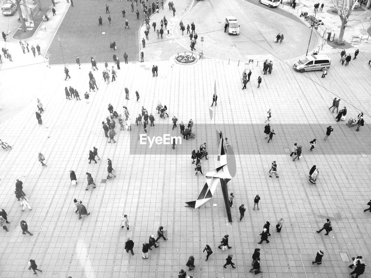 High angle view of people walking at pedestrian zone