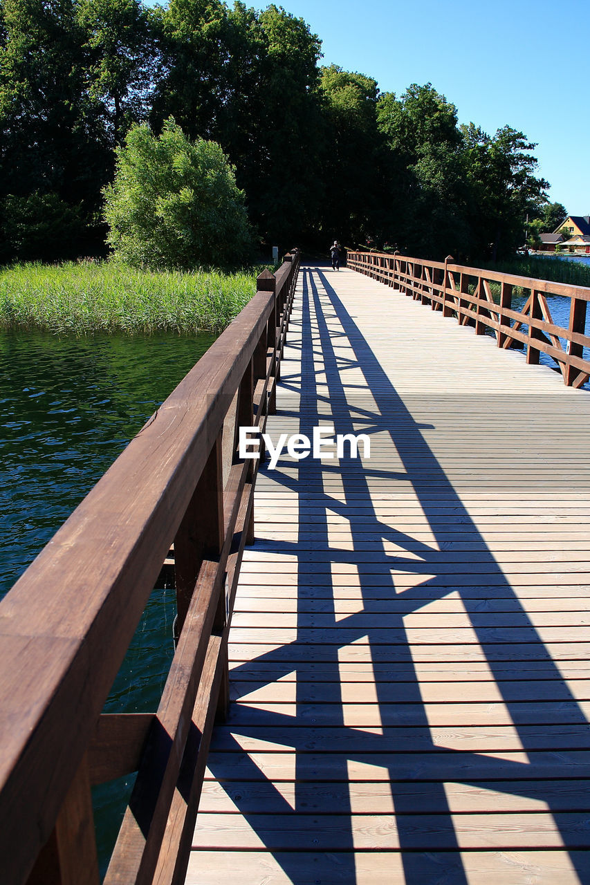 View of bridge against trees