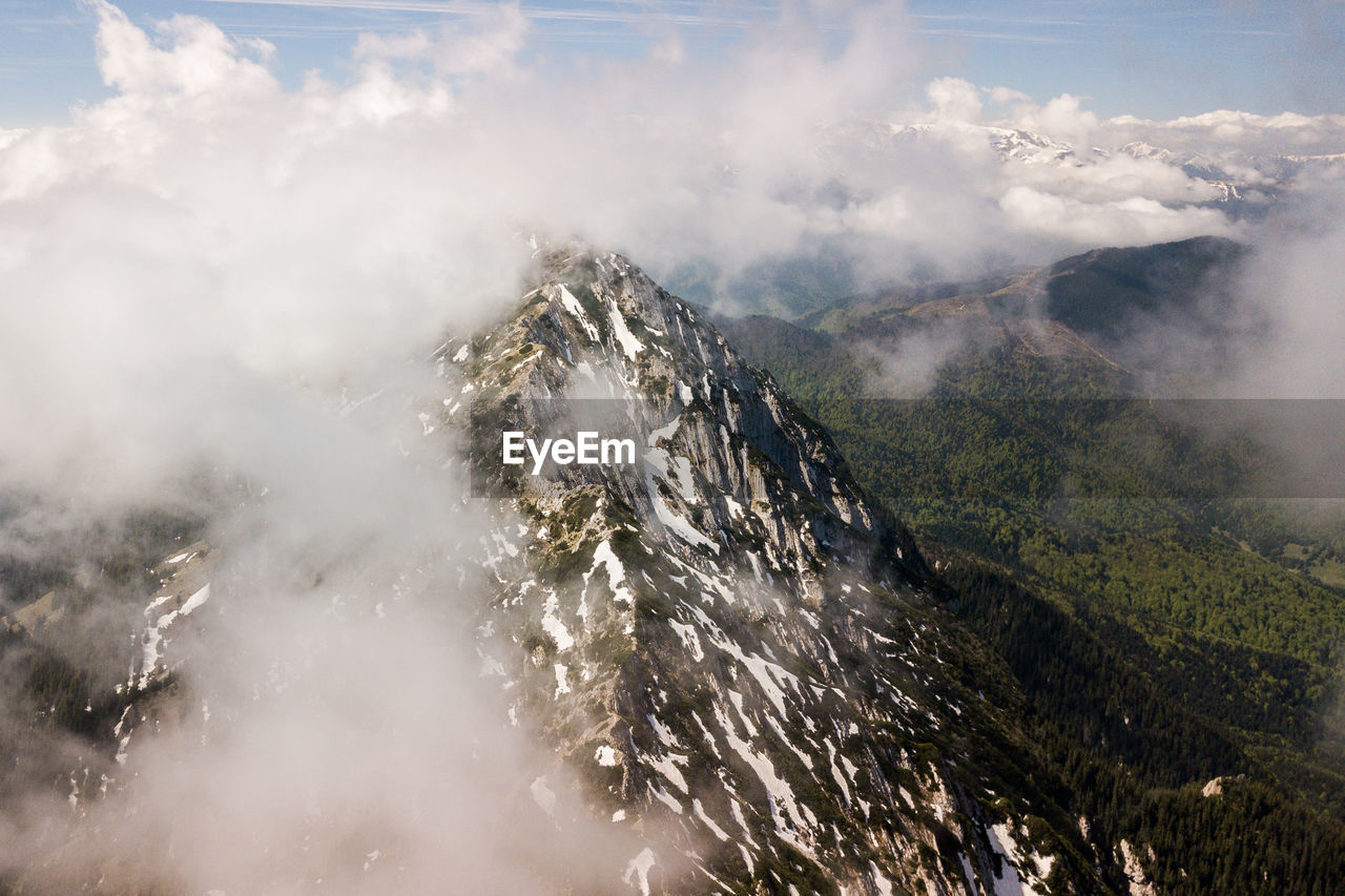 Scenic view of snowcapped mountain against sky